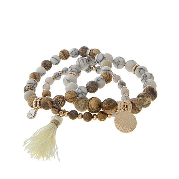 Wholesale three row stretch bracelet displaying brown howlite stone beads cream