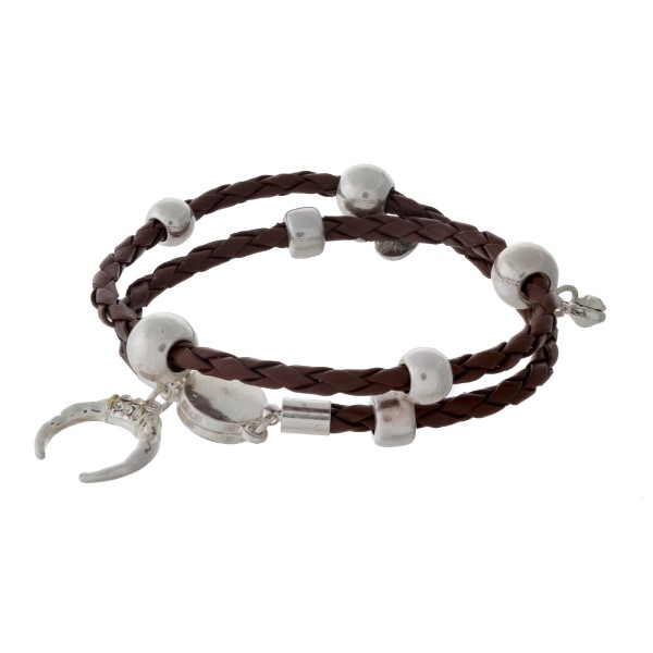 Brown braided cord wrap bracelet with silver tone hardware. 