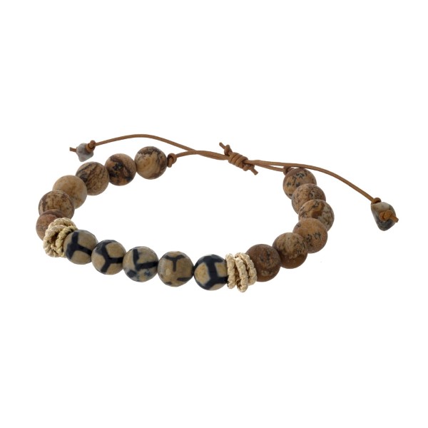 Brown cord adjustable bracelet with matte picture jasper and giraffe beads. Handmade in the USA.
