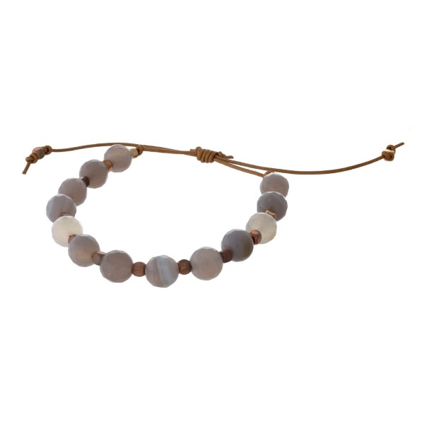 Brown cord adjustable bracelet with gray and gold stone beads. Handmade in the USA.