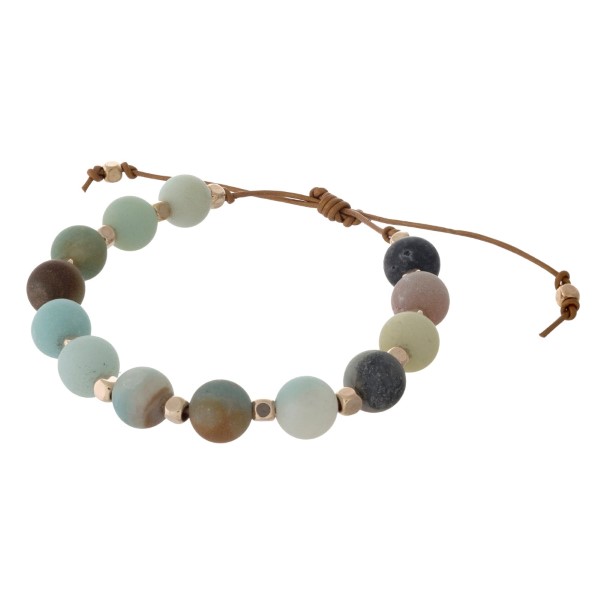 Brown cord adjustable bracelet with matte amazonite and gold stone beads. Handmade in the USA.