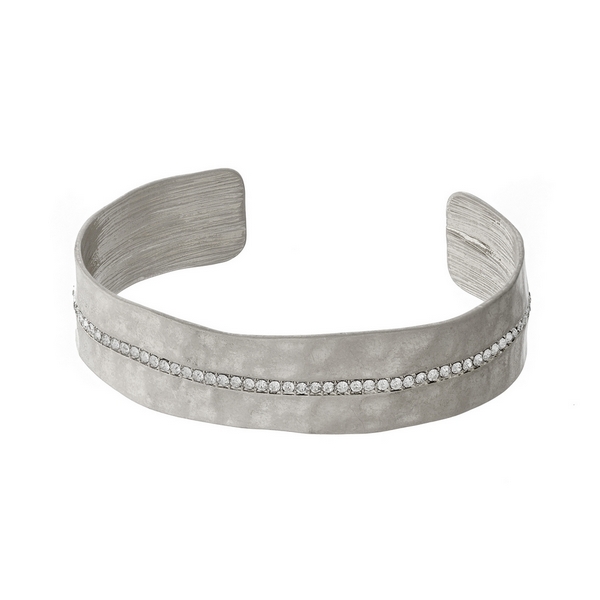 Hammered silver tone cuff bracelet with clear rhinestone detailing. 