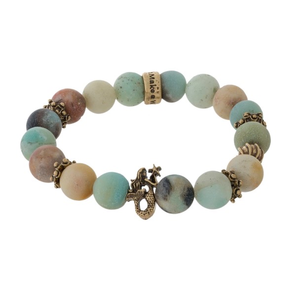 Natural stone beaded stretch bracelet with a gold tone, mermaid bead. 