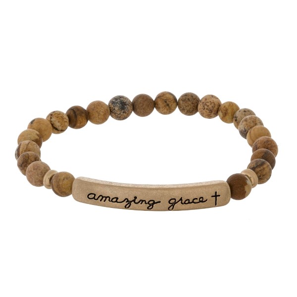 Beaded stretch bracelet with a bar focal, stamped with "amazing grace."