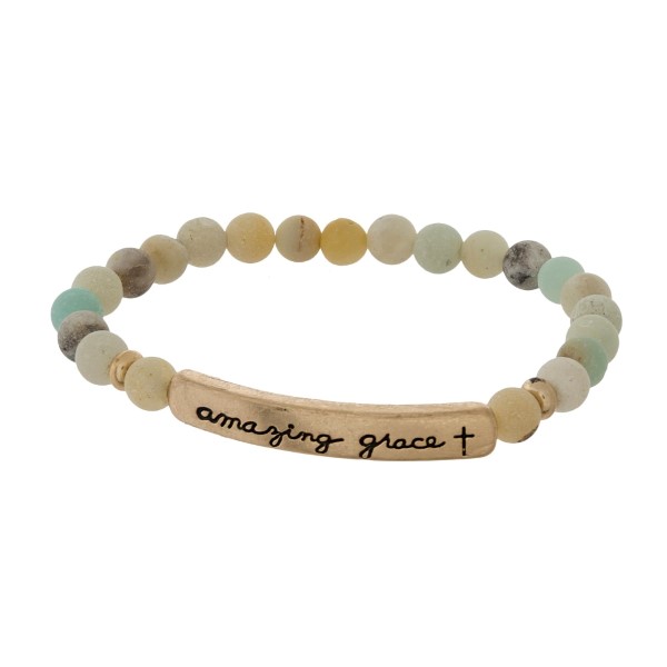 Beaded stretch bracelet with a bar focal, stamped with "amazing grace."