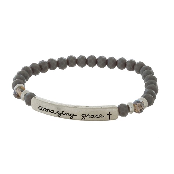 Beaded stretch bracelet with a bar focal, stamped with "amazing grace."