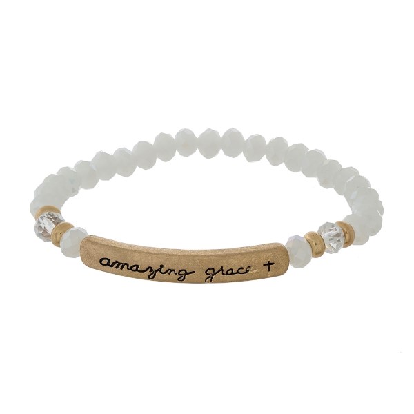 Beaded stretch bracelet with a bar focal, stamped with "amazing grace."