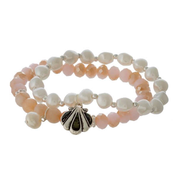 Two bracelet set with faceted beads, sea life charm, and pearl accents. 