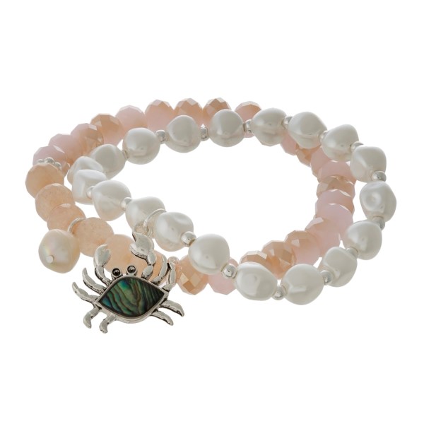 Two bracelet set with faceted beads, sea life charm, and pearl accents. 