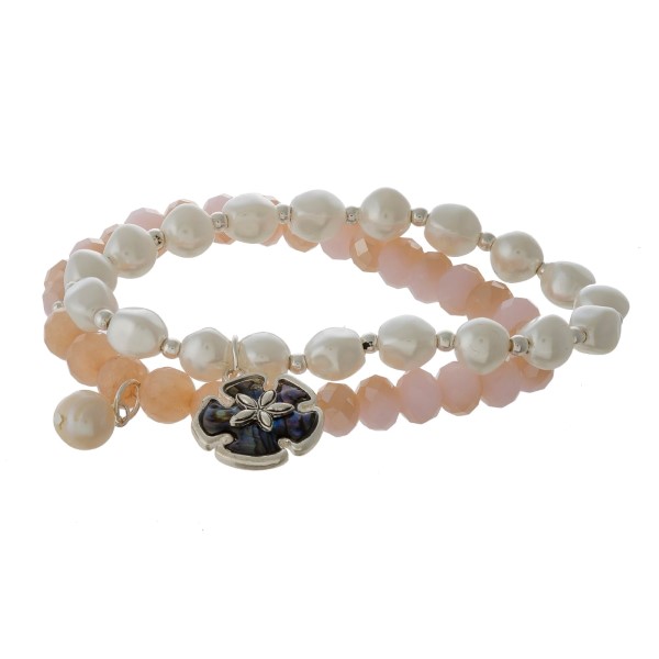 Two bracelet set with faceted beads, sea life charm, and pearl accents. 