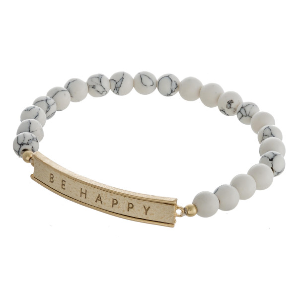 Natural stone beaded stretch bracelet featuring a faux leather focal with "Be Happy" engraved details. Approximately 3" in diameter unstretched. Fits up to a 6" wrist.