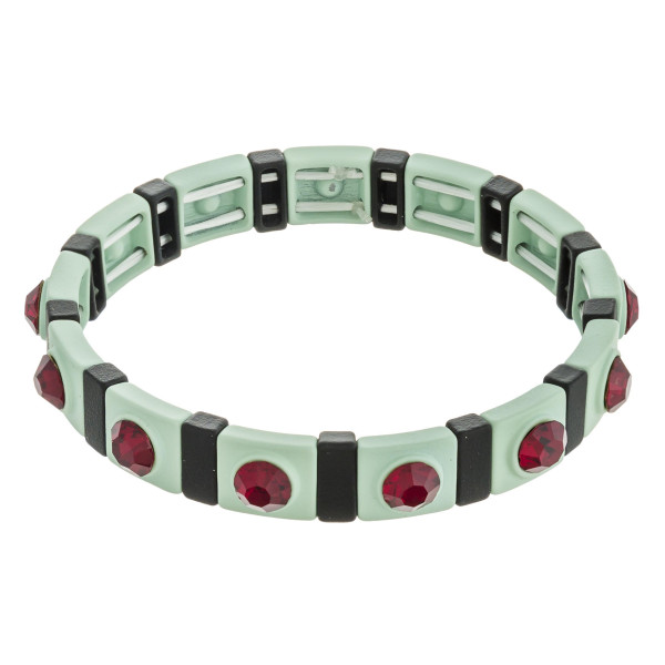 Two tone rhinestone color stretch bracelet. 

- Approximately 3" in diameter unstretched 
- Fits up to a 6" wrist 