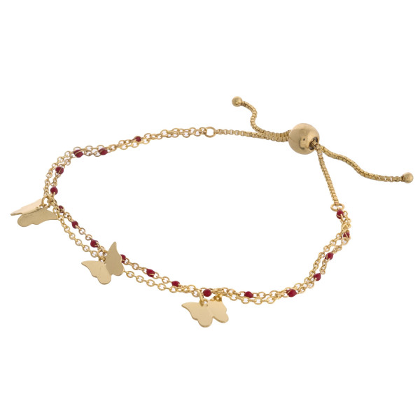 Dainty layered butterfly bolo bracelet. Approximately 3" in diameter. Fits up to a 6" wrist with adjustable bolo closure.