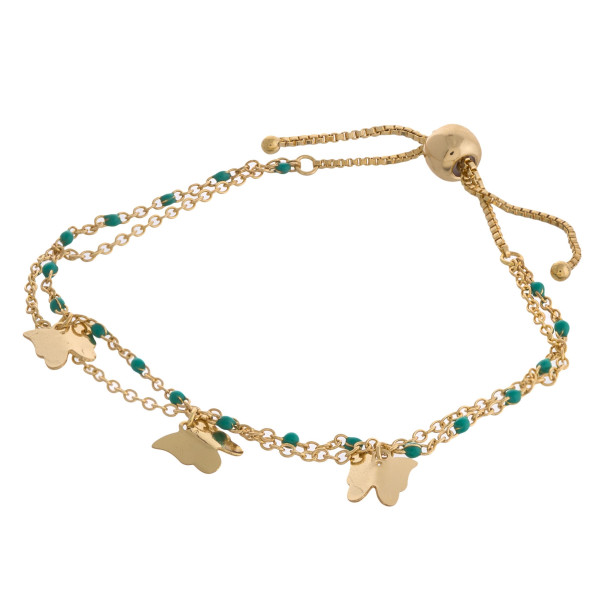 Dainty layered butterfly bolo bracelet. Approximately 3" in diameter. Fits up to a 6" wrist with adjustable bolo closure.