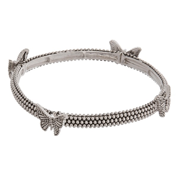 Antique silver butterfly metal stretch bracelet. 

- Approximately 3" in diameter unstretched
- Fits up to a 6" wrist