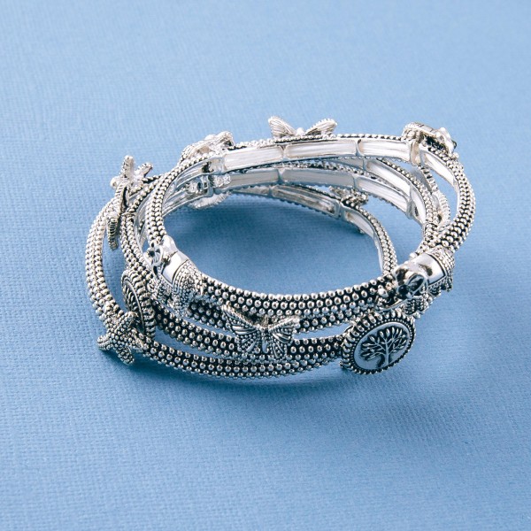 Antique silver butterfly metal stretch bracelet. 

- Approximately 3" in diameter unstretched
- Fits up to a 6" wrist