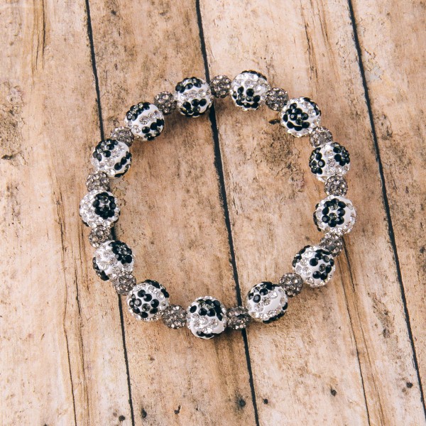 Black and white rhinestone leopard print stretch bracelet.

- Approximately 3" in diameter unstretched
- Fits up to a 6" wrist