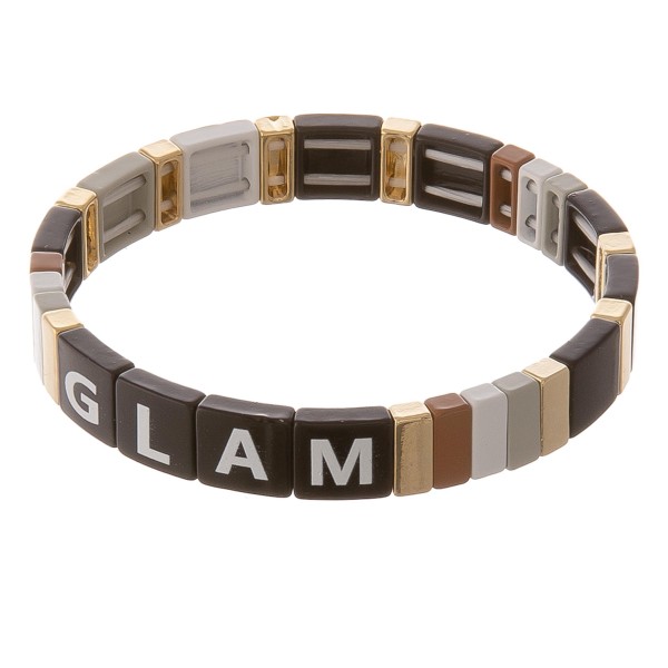 Shiny enamel coated "Glam" letter color block stretch bracelet.

- Approximately 3" in diameter unstretched
- Fits up to a 7" wrist