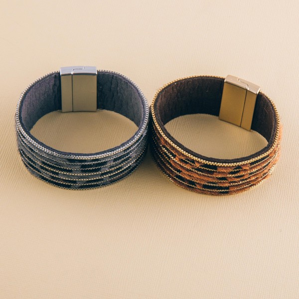 Leopard print cowhide metal striped magnetic bracelet.

- Faux leather
- Magnetic closure
- Approximately 3" in diameter
- Fits up to a 6" wrist