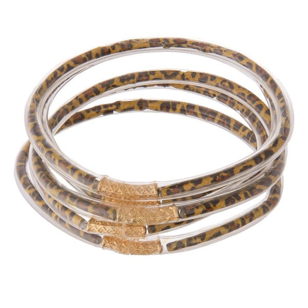 Leopard print jelly bangle bracelet set of five.

- Approximately 3" in diameter
- Fits up to a 6" wrist