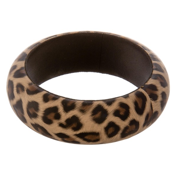 Leopard print bangle bracelet.

- Approximately 3" in diameter 
- Fits up to a 6" wrist 