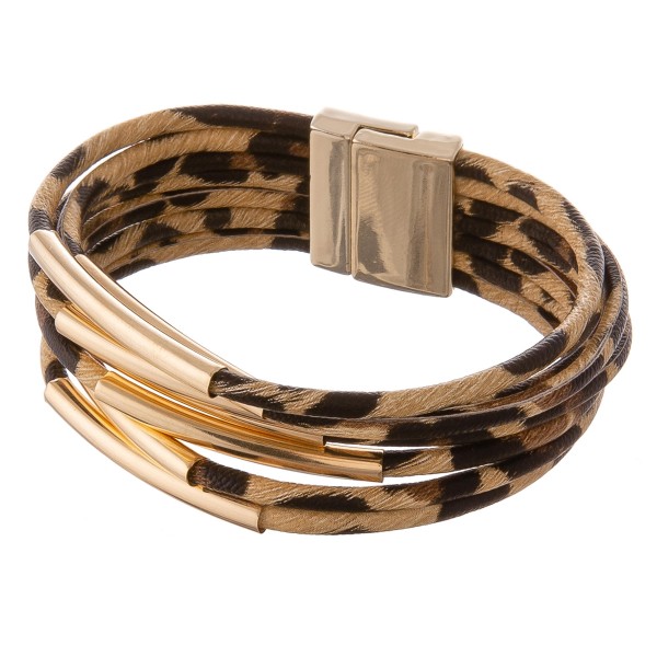 Faux leather multi strand leopard print magnetic closure with gold accents.

- Magnetic closure
- Approximately 3" in diameter
- Fits up to a 6" wrist