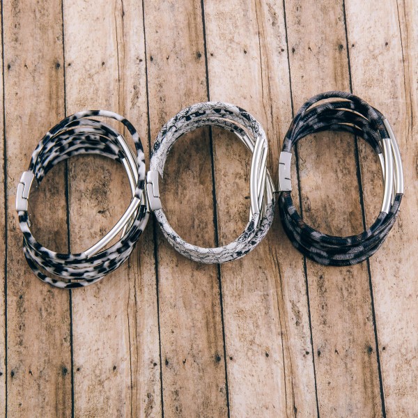 Faux leather multi strand leopard print magnetic bracelet with silver accents.

- Magnetic closure
- Approximately 3" in diameter
- Fits up to a 6" wrist 