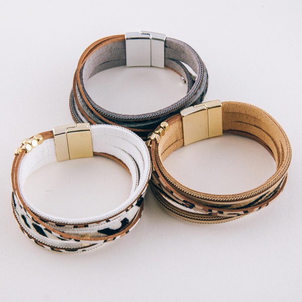 Faux leather multi strand animal print magnetic bracelet with gold bead accents.

- Magnetic closure
- Approximately 3" in diameter
- Fits up to a 6" wrist