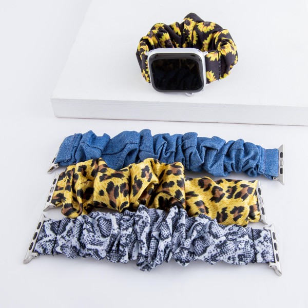 Interchangeable leopard print scrunchie smart watch band for smart watches.

- Fits 42-44mm watch face
- Approximately 3" in diameter unstretched
- Fits up to a 7" wrist