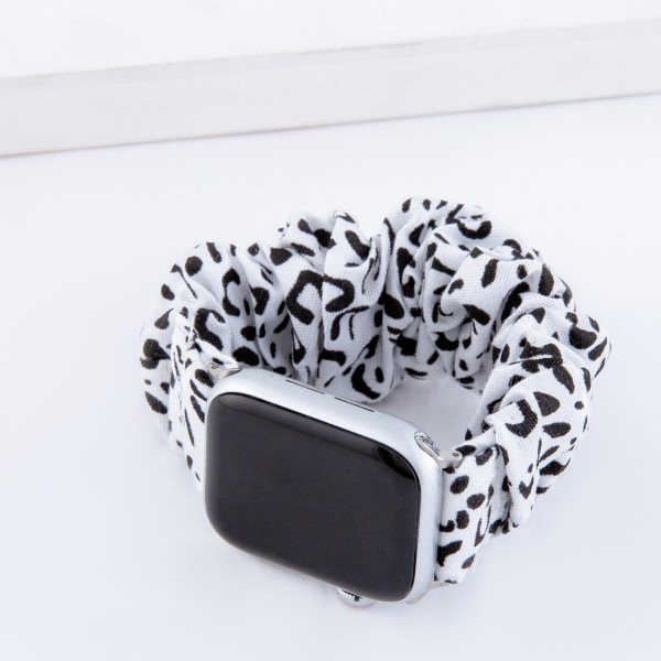 Interchangeable cheetah print scrunchie smart watch band for smart watches.

- Fits 38-40mm watch face
- Approximately 3" in diameter unstretched
- Fits up to a 7" wrist