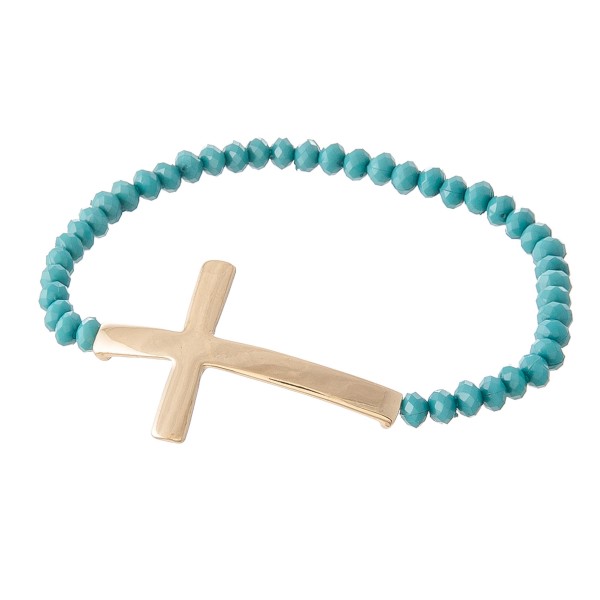 Beaded Cross Stretch Bracelet.

- Cross 1.5" 
- Approximately 3" in Diameter
- Fits up to a 7" Wrist