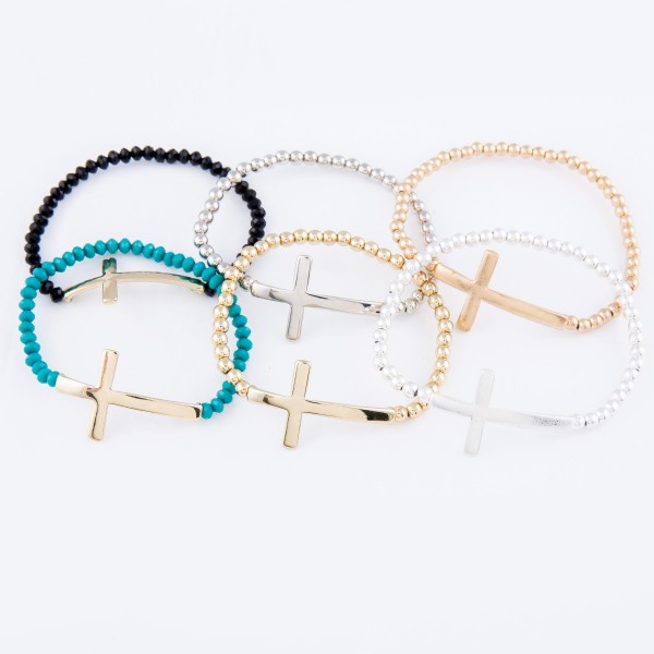 Beaded Cross Stretch Bracelet.
- Cross 1.5" 
- Approximately 3" in Diameter
- Fits up to a 7" Wrist