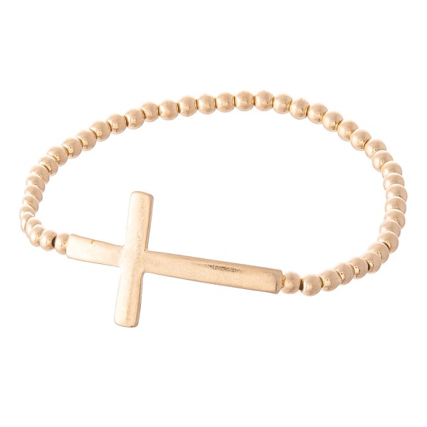 Beaded Cross Stretch Bracelet.

- Cross 1.5" 
- Approximately 3" in Diameter
- Fits up to a 7" Wrist