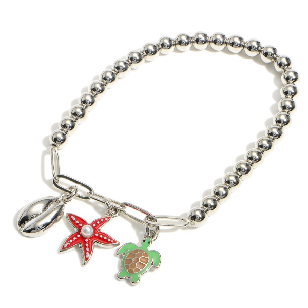 Beaded Metal Bracelet Featuring Chain Link Accents and Sea Life Pendants. 

- Approximately 3" in Diameter 