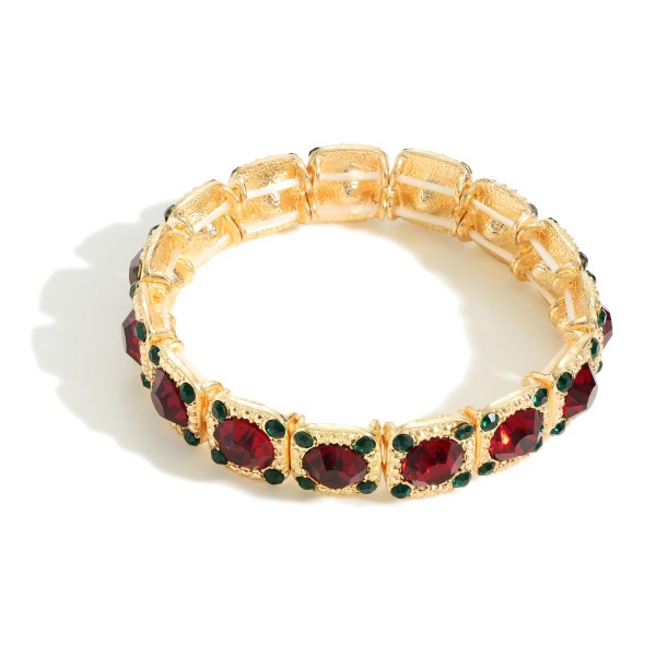 Gold Tone Stretch Christmas Bracelet Featuring Red and Green Rhinestones

- Approximately 2.5" Wide