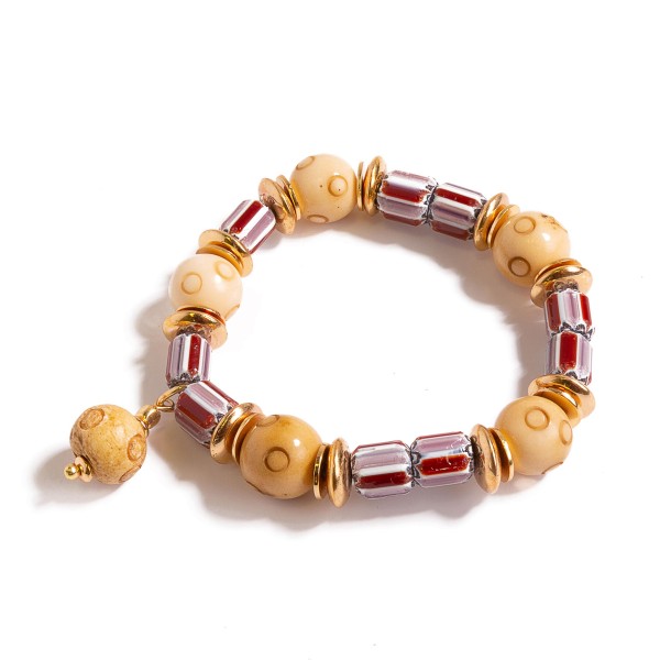 Striped Glass Beaded Stretch Bracelet Featuring Laser Cut Beads

- Approximately 2.5" Diamter