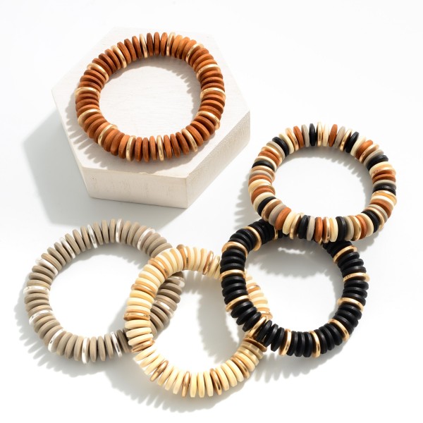 Chunky Wood Beaded Stretch Bracelet With Gold Accents

- Approximately 3" Diameter