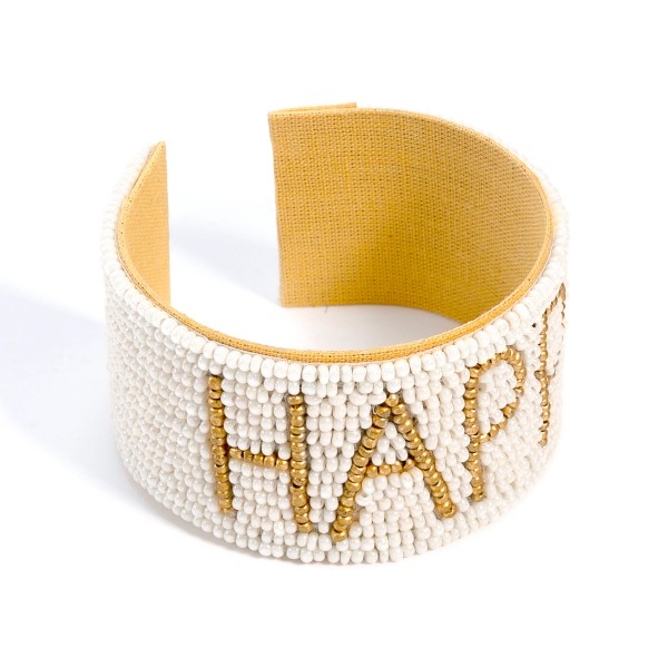 SeaBeaded Cuff Bracelet With "Happy" 

- Approximately 2" Diameter 
- Approximately 1.25" Wide