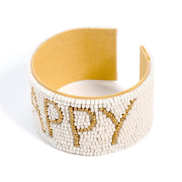 SeaBeaded Cuff Bracelet With "Happy" 

- Approximately 2" Diameter 
- Approximately 1.25" Wide