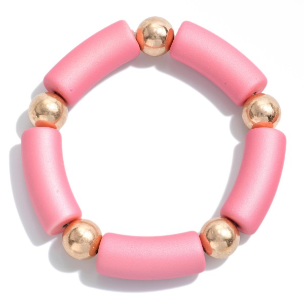 Tube Bead Stretch Bracelet with Gold Tone Bead Accents.c

- Approximately 2.5" Diameter