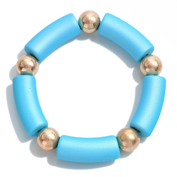 Tube Bead Stretch Bracelet with Gold Tone Bead Accents.

- Approximately 2.5" Diameter