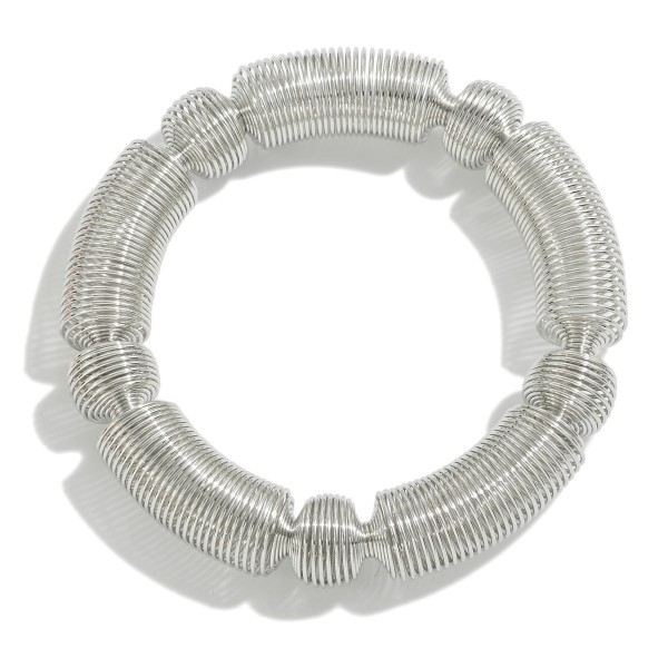 Metal Stretch Coil Bracelet With Taper Detail 

- Approximately 2.5" D