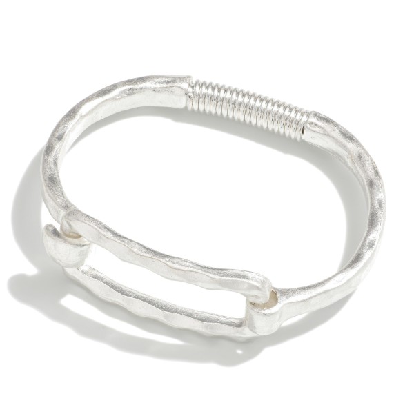 Hammered Metal Bangle Bracelet With Spring Latch Closure

- Approximately 2.75" Diameter