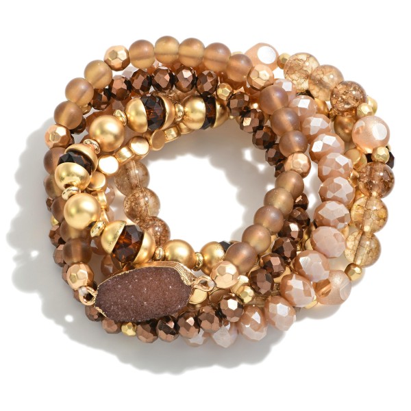 Set of 6 Beaded Stretch Bracelets Featuring Crystal Station and Gold Accents

- Approximately 2.5" Diameter