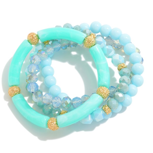 Set of Four Acrylic Tube and Glass Beaded Stretch Bracelets With Gold Tone Accents

 - Approximately 2.5" Diameter