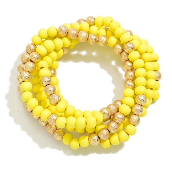 Set of Five Wood Beaded Stretch Bracelets Featuring Gold Foil Textured Accent Beads

- Approximately 2.5" D