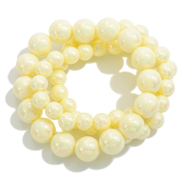 Set of Three Pearlescent Beaded Stretch Bracelets With Graduating Bead Size

- Approximately 2.5" D