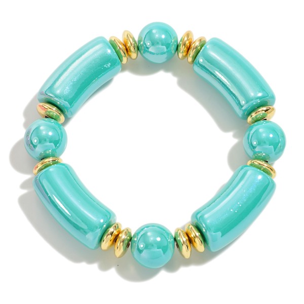 Chunky Abalone Tube and Circular Bead Stretch Bracelet With Gold Tone Accents

- Approximately 2.5" D