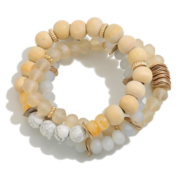 Set of Three Beaded Stretch Bracelets Featuring Wood and Stone Beads With Metal Disk Accents

- Approximately 2.5" D