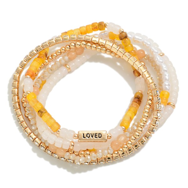 Set of Six Beaded Bracelets Featuring 'Loved' Bracelet 

- Approximately 2.5" D 